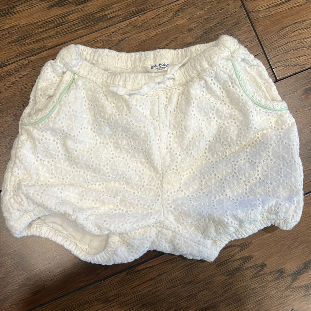 Baby Boden white eyelet shorts with light blue piping 12 to 18 months